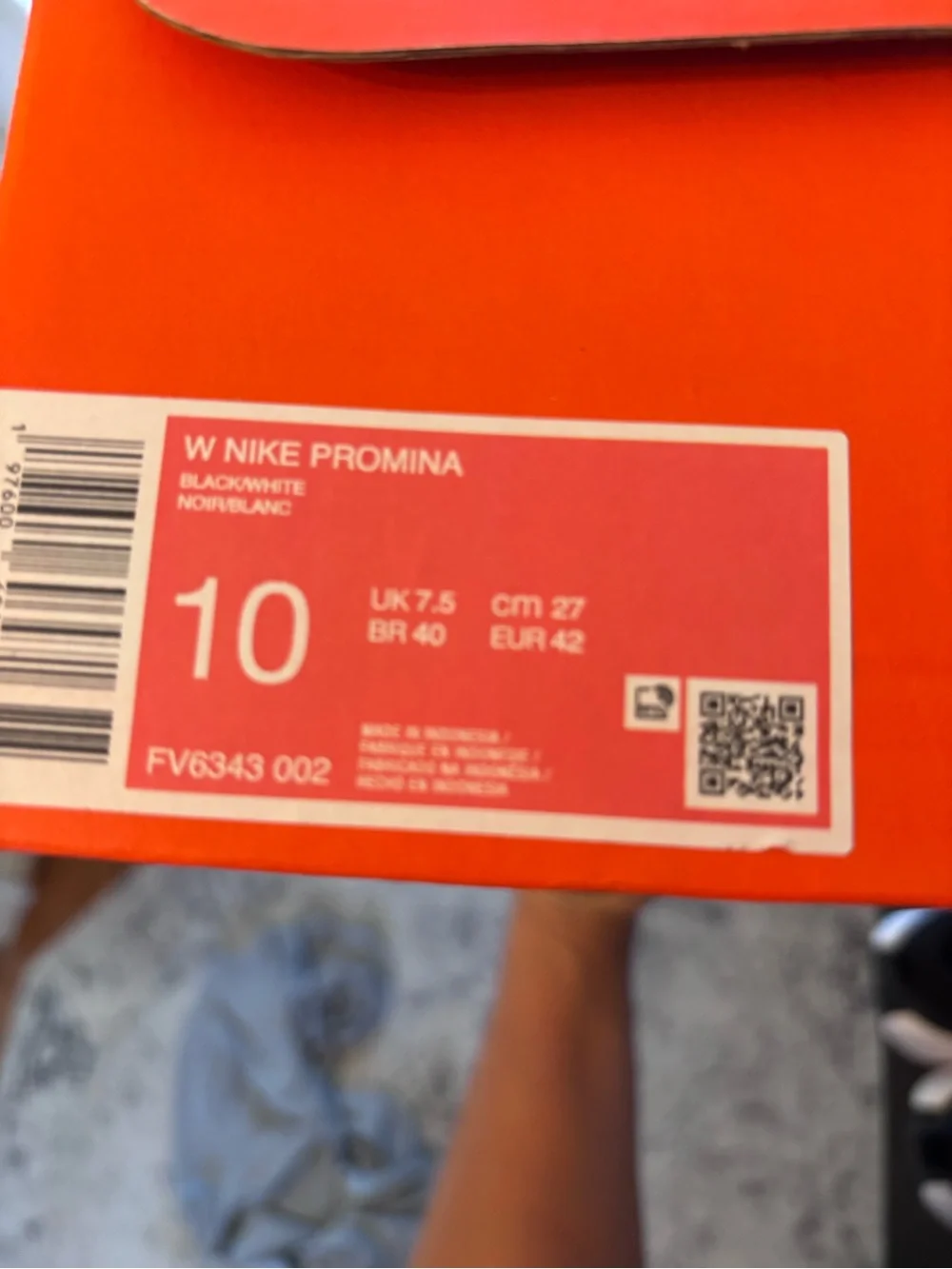 Women’s Nike Promina Black and White Running Sneakers with White Swoosh